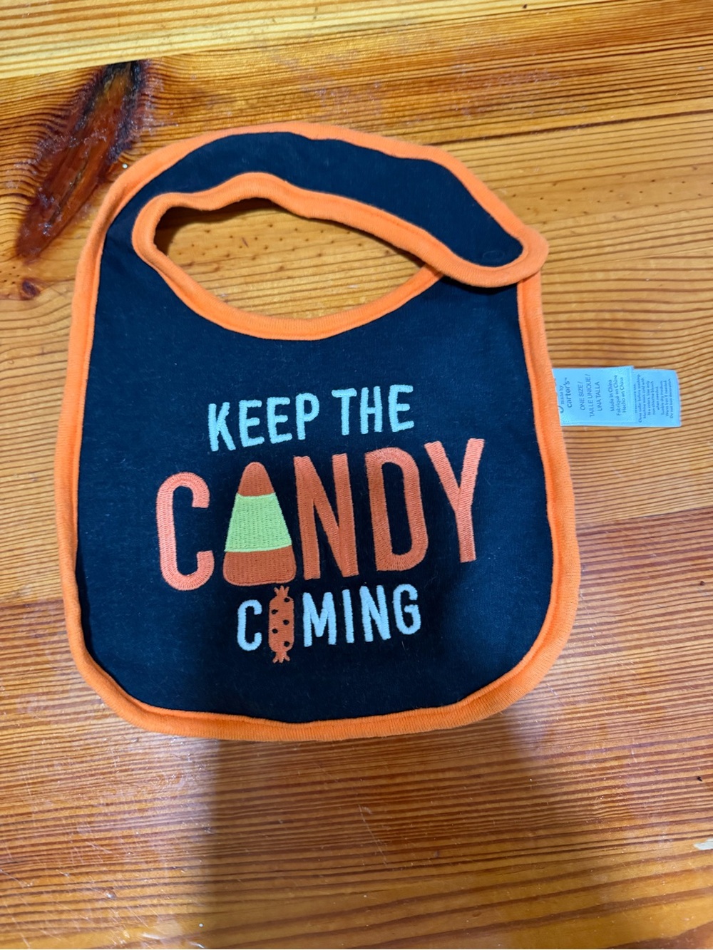 Carter's Black Bib with Orange Trim 'Keep the Candy Coming'
